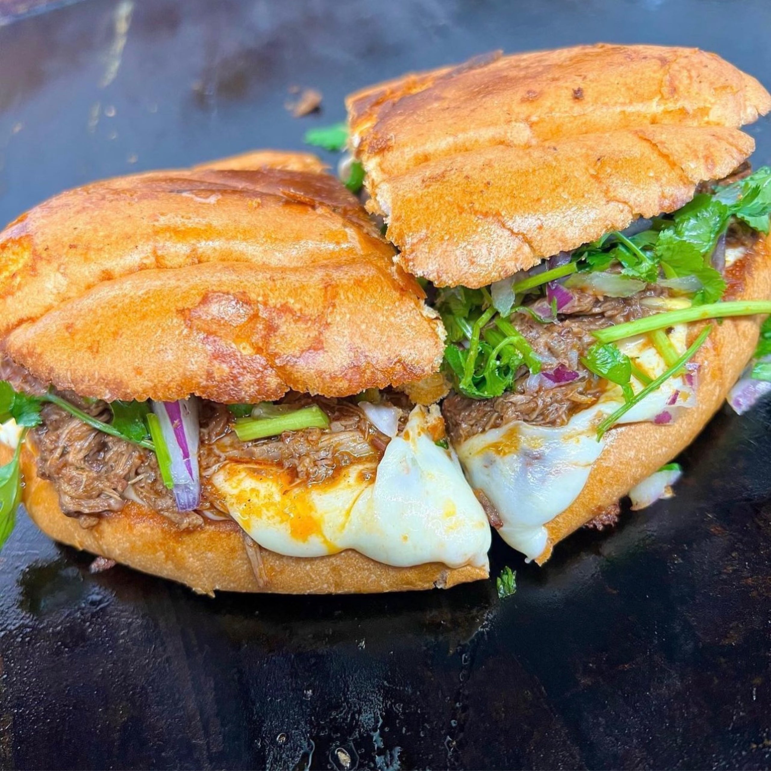 Torta de Birria w/ Consomé Tacos A La Madre